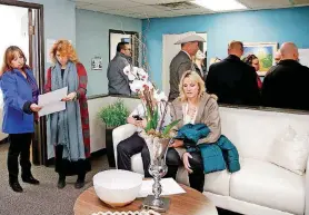  ?? [PHOTOS BY BRYAN TERRY, THE OKLAHOMAN] ?? BELOW: People tour the center during its opening.