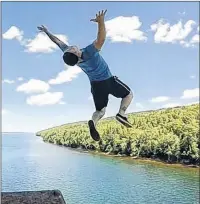  ?? SUBMITTED PHOTO ?? Logan LaTulippe makes his jump off Seal Island Bridge.