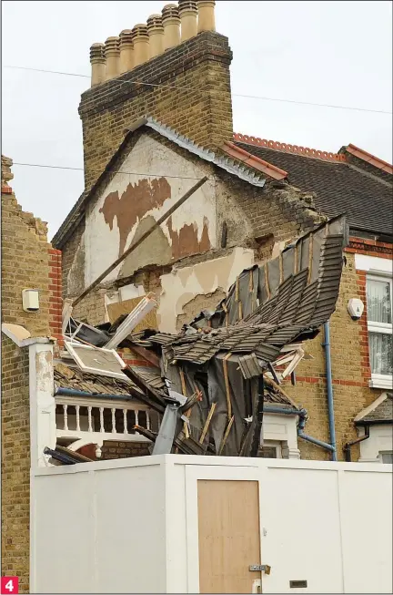  ??  ?? Reduced to rubble: Tiles, timber and roof felt cover the gaping hole in the front of the £660,000 house 4