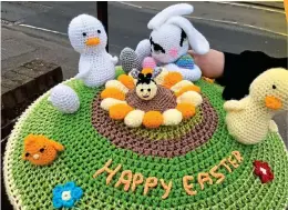  ??  ?? Stamp of approval: A gang of carefully crocheted cuddly creatures brighten up the street in Clacton-on-Sea, Essex