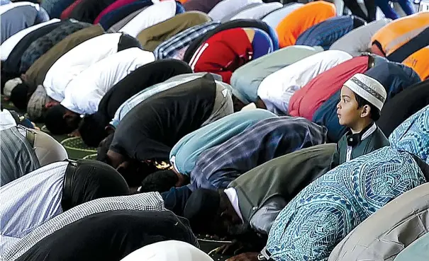  ?? DAVID UNWIN/STUFF ?? In Palmerston North, worshipper­s of all ages filled the city’s mosque for Friday prayers, just one week after the terror attacks in Christchur­ch.