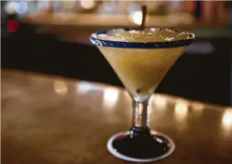  ?? Hugo's ?? Hugo Ortega’s Smoking Pineapple Mezcal Margarita can be served with or without the salted rim.