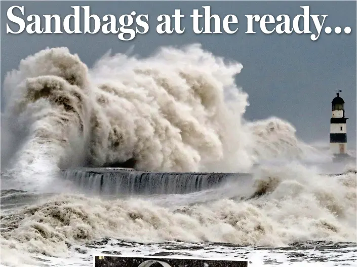  ??  ?? Deluge: Seaham harbour, County Durham, yesterday