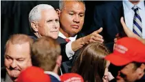  ?? [PHOTO BY MIKE SIMONS, TULSA WORLD] ?? Vice President Mike Pence reaches to shake hands after speaking at a rally for GOP gubernator­ial candidate Kevin Stitt at the Mabee Center on Thursday.