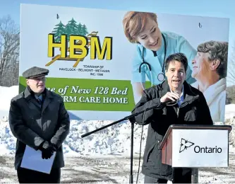  ?? JOELLE KOVACH/EXAMINER ?? Havelock-Belmont-Methuen Township Mayor Ron Gerow, left, with Health and Long-Term Care Minister Eric Hoskins in Havelock on Monday afternoon as Hoskins announced approval for a new 128-bed long-term care home in Havelock.