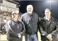  ?? FILE PHOTO ?? These three Farmington football coaches represent 34 years of football seasons at Allen Holland Field in Farmington. Bryan Law, left, served as coach 1999-2003, Allen Holland from 1969-1991 and Jay Holland from 19921998. Farmington varsity football played its last home game at Holland Field on Friday, Nov. 2, 2018 and opened its new facility, Cardinal Stadium at Farmington Sports Complex in August of 2019.