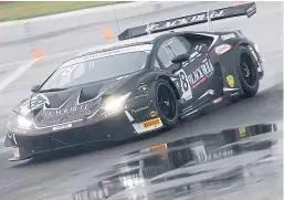  ?? Picture: Mcmedia. ?? Sandy Mitchell in the Lamborghin­i Huracan Evo GT3 at a wet Donington Park.