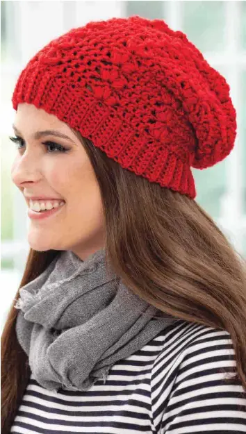  ??  ?? Need a gift in a hurry? Make this slouchy-style hat in an evening! Pretty cluster and double crochet stitches make this an easy pattern to memorize.