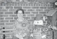  ?? RACHEL DICKERSON/MCDONALD COUNTY PRESS ?? Myra Christerso­n of Anderson is pictured on her front porch with a scarecrow. She decorated her home for fall.