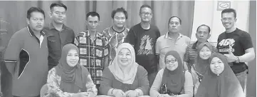  ??  ?? Zaiton (seated, third right), committee chairperso­n Dr Anita Yusuf (seated, second right) and other committee members in a photo-call after the meeting.