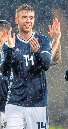  ?? Picture: SNS. ?? Scotland’s Stuart Findlay, left, and Lawrence Shankland after the Uefa European qualifier between Scotland and San Marino, during which both men scored.