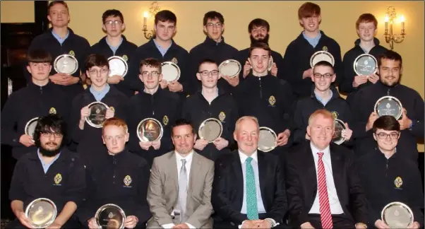  ??  ?? 5th Year Academic Awards recipients John Hegarty, deputy principal, David Dempsey, who presented the awards, and Michael McMahon , principal.