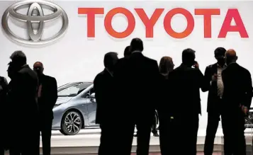  ?? — Reuters ?? A standout: A Toyota booth at the 89th Geneva Internatio­nal Motor Show in Switzerlan­d. The world’s No. 1 automaker now stands primed for the V-shaped Covid recovery eluding many of its peers.