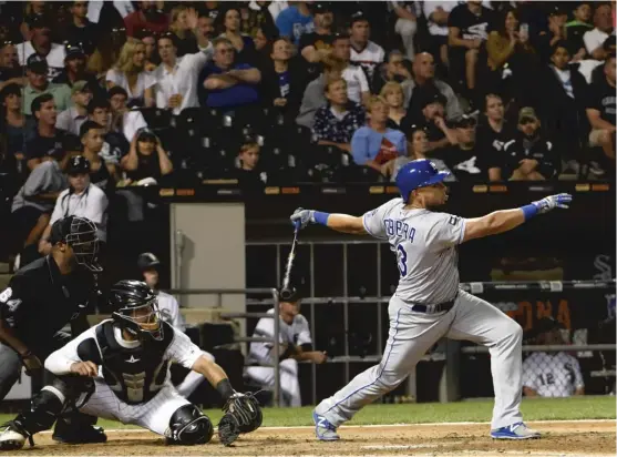  ??  ?? Former White Sox outfielder Melky Cabrera hits a go- ahead two- run homer in the eighth inning. Cabrera is hitting .314 since being traded to the Royals. | DAVID BANKS/ GETTY IMAGES