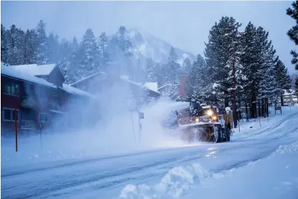  ?? Samantha Lindberg/AP Maine, ?? A snow plow clears a road in Mammoth Lakes, California, on Tuesday. More snow is forecast for the Sierra Nevada mountains. Photograph: