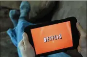  ?? ELISE AMENDOLA / ASSOCIATED PRESS ?? A Comcast spokeswoma­n said that Netflix viewing will count against customer data caps just like any other online app.