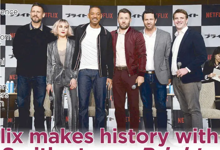  ??  ?? At Bright’s press conference at Tokyo’s Ritz-Carlton Hotel are (from left) director David Ayer, actors Noomi Rapace, Will Smith and Joel Edgerton, and producers Eric Newman and Bryan Unkeless