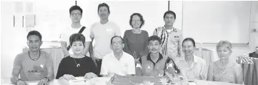  ??  ?? Chang (seated, second left) and Ng (seated, third right) with members of the organising committee and supporters of the St Joseph’s School Run 2017.