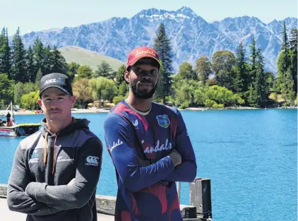  ?? PHOTO: TRACEY ROXBURGH ?? Ready to roll . . . New Zealand A captain Cole McConchie (left) and his West Indies counterpar­t, Roston Chase, enjoy the sun in Queenstown yesterday.