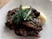  ?? ?? OXTAIL cooked in herbs and red wine.