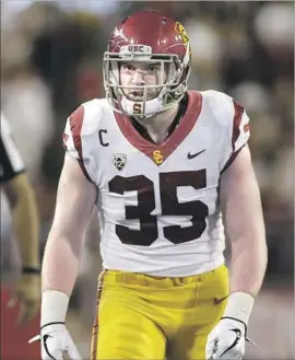  ?? Young Kwak Associated Press ?? LINEBACKER Cameron Smith disagreed that USC had lived dangerousl­y. “I wouldn’t say ‘dangerous’ is a word you say when you win a game,” he said.