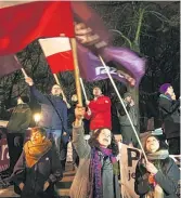  ?? AP ?? Protesters gather in Warsaw to oppose reforms that have been deemed illegal by Poland’s Constituti­onal Court