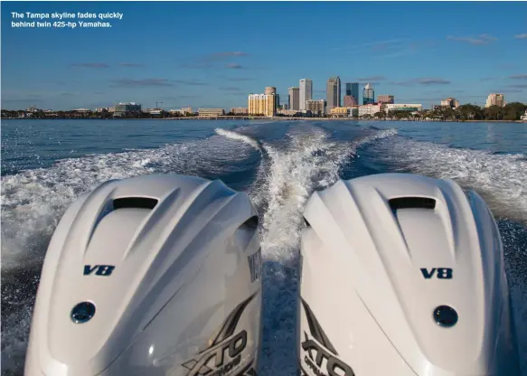  ??  ?? The Tampa skyline fades quickly behind twin 425-hp Yamahas.