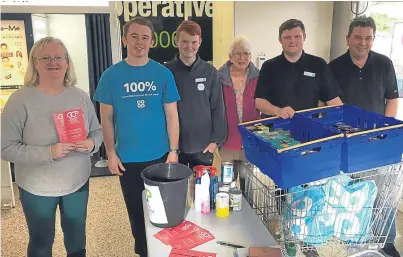  ??  ?? Brechin Community Pantry volunteers and staff from the town’s Co-op store at a food collection.