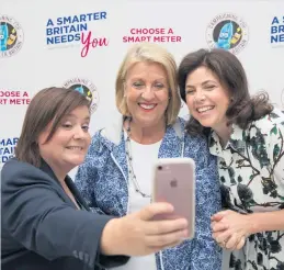  ??  ?? Selfie time Susan Calman and Kirstie Allsopp posed for photos with a fan at intu Braehead as part of their campaign