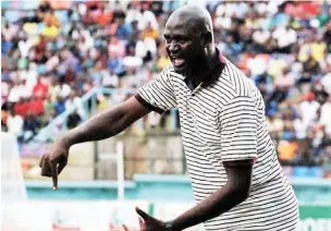  ??  ?? Former Nasarawa United coach, Kabiru Dogo dishing out instructio­ns to his players.