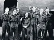  ??  ?? Rothwell (third from right) with his crew and their Stirling bomber: German forces saw their crash and Rothwell and his navigator were captured and sent to Stalag Luft I