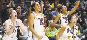  ?? Jessica Hill / Associated Press ?? UConn’s Gabby Williams (15), Kia Nurse (11), and Azurá Stevens (23) have been invited to attend the WNBA Draft.