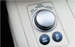  ??  ?? This rotary knob on the console enables the driver to dial in three different Drive modes: Eco, Normal and Sport.