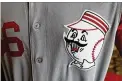  ?? JOHN MINCHILLO / AP ?? Manager David Bell’s grandfathe­r, Gus Bell, wore this uniform when the Reds’ 1956 team tied the big-league record for home runs.