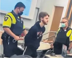  ?? AL@METABO_PHD TWITTER ?? A video captured Western student Harry Wade being handcuffed by campus police.