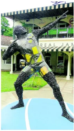  ??  ?? This statue of track and field legend Usain Bolt, made of screws, bolts and metal plates by German sculptor Diedel Kloever in 2012, was the first to be mounted in the Montego Bay Legends Circle.