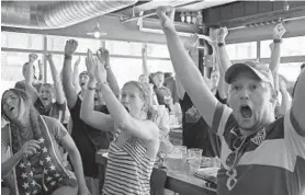  ?? KARL MERTON FERRON/BALTIMORE SUN ?? U.S. fans react at a watch party at Diamondbac­k Brewing Company as the game-tying goal by England is overturned on review Tuesday in the Women’s World Cup semifinal.