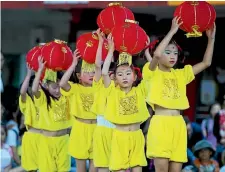  ?? PHOTO: DOMINICO ZAPATA/STUFF ?? Young dancers at Hamilton’s Lantern Festival. Nationally, the occasion has become the country’s biggest free event.