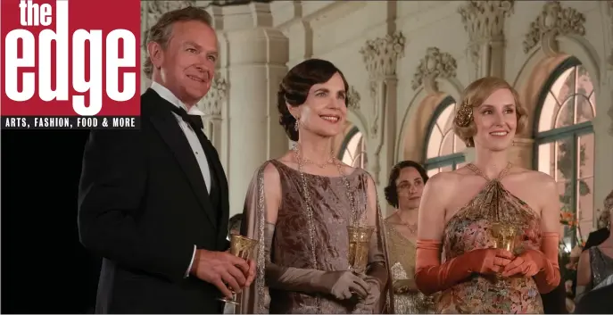  ?? FOCUS FEATURES ?? FAMILY REUNION: Hugh Bonneville and Elizabeth McGovern return as Robert and Cora Crawley. the Earl and Countess of Grantham, and Laura Carmichael as Lady Edith Pelham in ‘Downton Abbey: A New Era.’