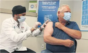  ?? STEVE RUSSELL TORONTO STAR FILE PHOTO ?? Premier Doug Ford gets his second dose June 24. Ford finally saw his way to cracking down on health-care workers and ordering civil servants to get vaccinated, Martin Regg Cohn writes.