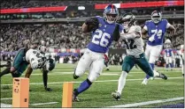  ?? ADAM HUNGER/ASSOCIATED PRESS ?? Running back Saquon Barkley didn’t sign his franchise tag with the Giants in 2023 and wound up playing last season for $10.1 million. Now he’ll see if he can get more.