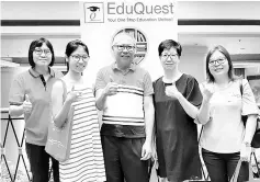  ??  ?? Yap (left) and Adelaide (second left) with her proud parents (centre and second right) and aunt during her second visit to a EduQuest education fair.
