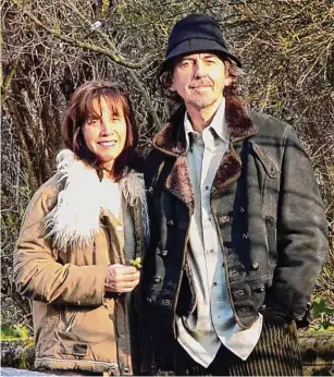  ?? Associated Press file photo ?? Former Beatle George Harrison and his wife, Olivia, vacation in Ireland in 2000.