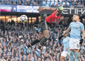  ?? AFP ?? Manchester United’s Paul Pogba scores his team’s second goal against Manchester City at the Etihad Stadium.