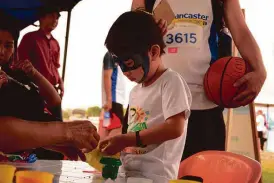  ??  ?? Face painting was among the activities in store for the young ones.