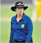  ??  ?? Taking charge: Claire Polosak became the first woman to umpire England