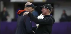  ?? Bruce Kluckhohn / ap ?? chicago Bears head coach matt nagy, left, talks with minnesota Vikings head coach mike Zimmer. Both were both fired on monday.