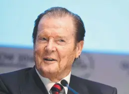  ?? GOOD LAUGH: James Bond actor Roger Moore. Picture: AAP ??