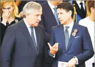  ?? Alberto Pizzoli / AFP / Getty Images ?? Italy’s Prime Minister Giuseppe Conte, right, talks with European Parliament President Antonio Tajani during a ceremony marking the anniversar­y of the Italian Republic on Saturday in Rome.