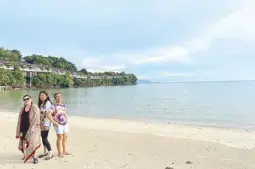  ?? ?? Author Christine Dayrit with Rita Trinidad and Büm Tenorio before the well-ensconced Villa Angelina Luxury Suites in Dapitan, Zamboanga del Norte